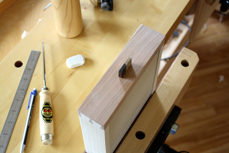 Drawer pull inserted into drawer mortise